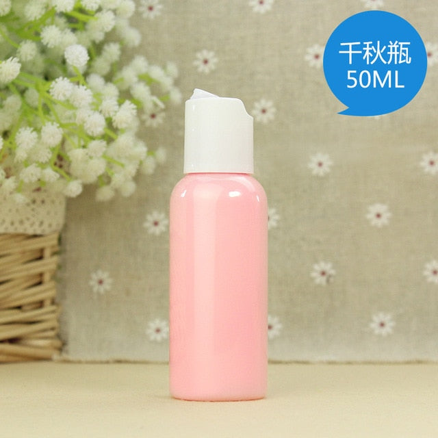eTya  Portable Travel Empty Cosmetic Containers Cream Lotion Plastic Bottles Bags Pouch  Travel Accessories